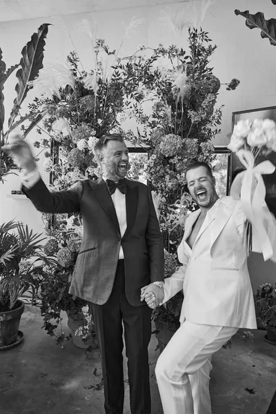   Jules Von Hep i Mark Beverlo slave nakon ceremonije vjenčanja