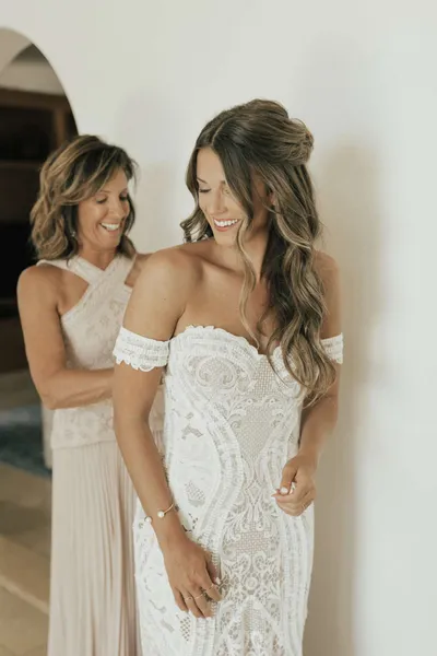   Kenzie's off-the-shoulder lace fit-and-flare gown